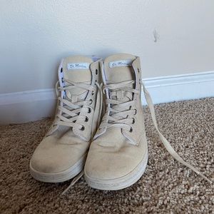 Dr. Martens high top shoe